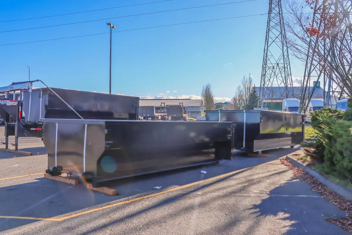 Roll-off dumpster ready for waste disposal at job site for Commercial Dumpster Rental in Morrisville